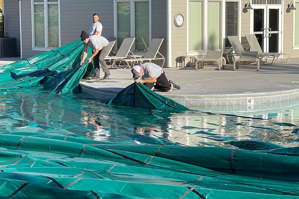 removing-swimming-pool-cover removing-swimming-pool-cover